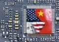 The Chinese and US flags overlaying microchips.